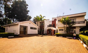 Village Villa - Deluxe Rooms By The UN